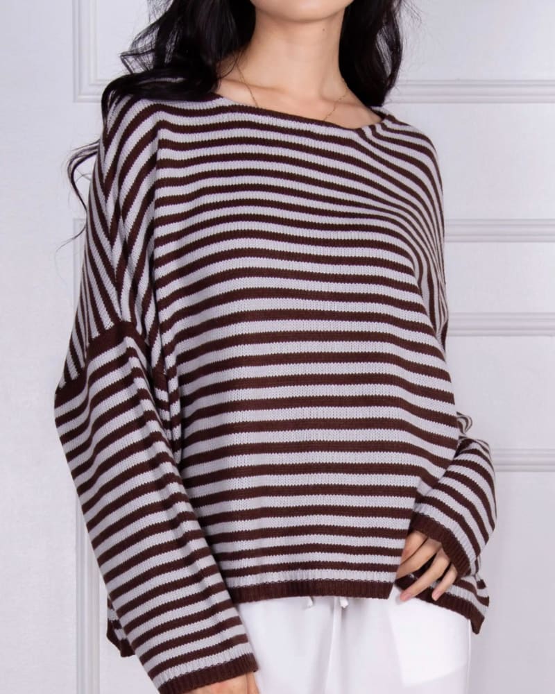 Front of a model wearing a size L Dropped-Shoulder Striped Knit Sweater in Powder Blue/Brown in Powder Blue/Brown by Before You. | dia_product_style_image_id:336128